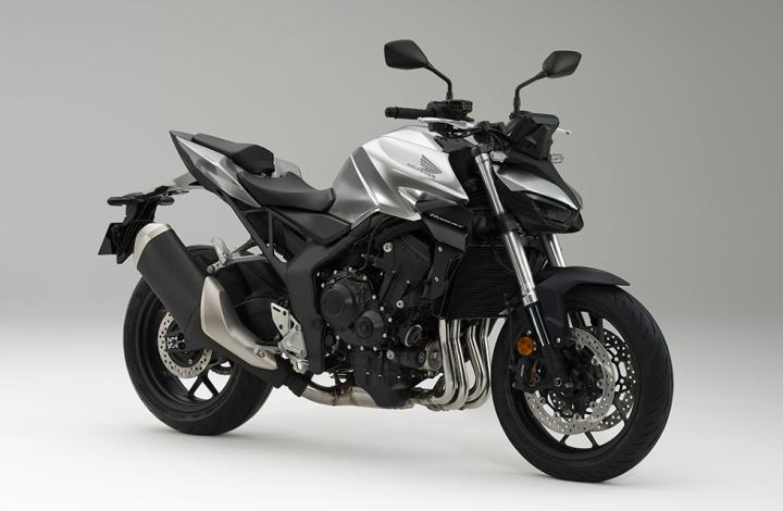 2023 Eicma Fuarında Tanıtılan Honda Modelleri | Honda CB1000 Hornet, CBR600RR, Hornet 500, NX500... Motoru saran, Pro ile uyumlu, hem sıkıştırma hem de geri tepme için ayarlanabilen Showa 41 mm Ayrı Fonksiyonlu Çatal Büyük Piston (SFF-BP) süspansiyonu aracılığıyla dinamik viraj alma performansı ve stabilitenin benzersiz bir karışımını sunan tamamen yeni çelik ikiz direkli çerçevedir. -bağlantılı arka Showa şoku. Stil saf ve agresif. Süper kompakt çift LED projektör farların delici bakışlarıyla yönlendirilen, kanatları öne doğru katlanmış Hornet imzalı yakıt deposu, önde geniş omuzlu, ancak arkaya doğru radikal bir şekilde inceliyor ve geleneksel dar tasarımın altını çizen minimal koltuk ünitesiyle yansıtılıyor. belli Hornet görünümü. Yeni çerçeve aynı zamanda bir tasarım özelliği olarak da kullanılıyor ancak boru şeklindeki kafes tarzı arka alt çerçeve gibi zarif bir şekilde karartılıyor.